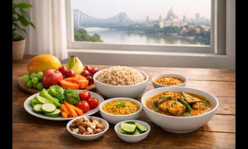 Balanced Bengali diet with fruits, vegetables, rice, dal and fish in a Kolkata home setting promoting healthy lifestyle and nutrition